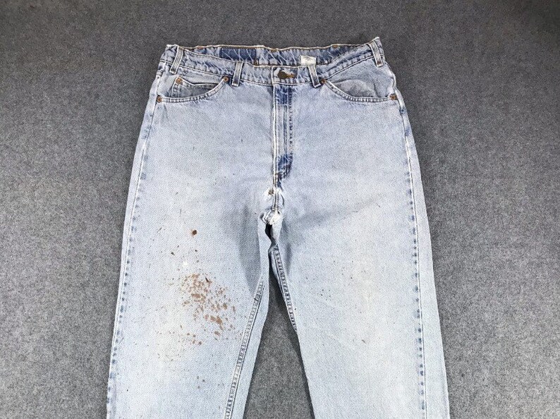 Vintage 90s Light Wash Levis 550 Orange 