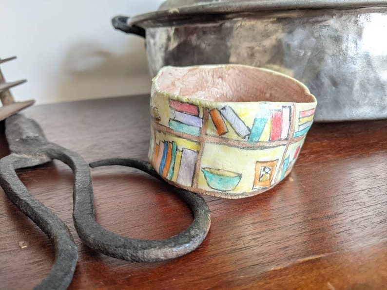 Clay bangle bracelet featuring a hand painted bookcase scene, wearable whimsical clay art image 3