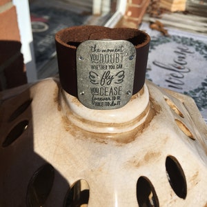 Leather Cuff with FLY quote - “The moment you doubt whether you can fly, you cease forever to be able to do it”