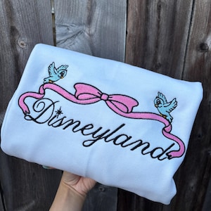 Pink Disneyland Sweatshirt: Embroidered Bow Cinderella Design