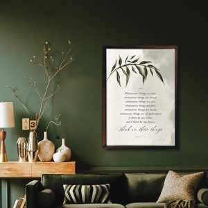 May include: A framed print featuring a green leafy branch and a quote from Philippians 4:8: "Whatever things are true, whatever things are noble, whatever things are just, whatever things are pure, whatever things are lovely, whatever things are of good report, if there be any virtue, and if there be any praise, think on these things."