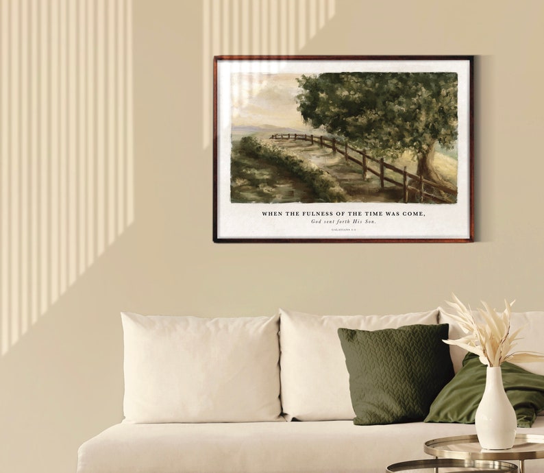 May include: A watercolor painting of a landscape with a tree and a fence. The painting is framed in a brown frame and has the text "When the fullness of the time was come, God sent forth His Son."  Galatians 4:4