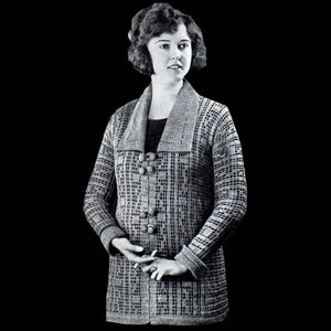 May include: A black and white photo of a woman wearing a knitted cardigan with a checkered pattern and large buttons.