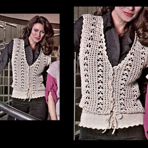 May include: A crocheted vest with a V-neck and button closure. The vest is white and has a delicate lace pattern. It is tied at the waist with a string.