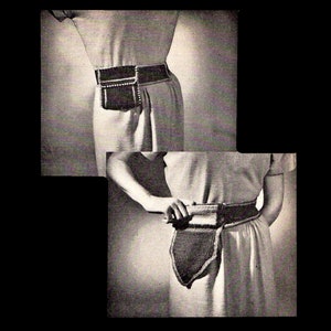 May include: Two images of a black and white crocheted belt with a pouch. The belt is worn over a simple dress.