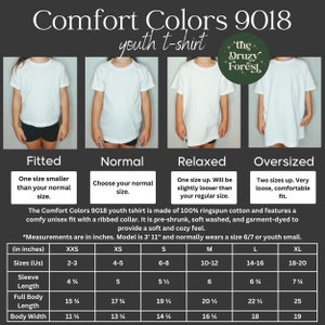 May include: A size chart for Comfort Colors 9018 youth t-shirts. The chart shows the different sizes available, from XXS to XL, and the corresponding measurements in inches for sleeve length, full body length, and body width. The chart also includes a description of the fit for each size: fitted, normal, relaxed, and oversized.