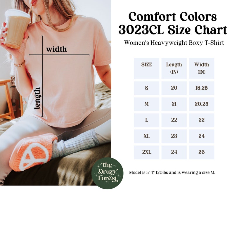 May include: Size chart for a women's heavyweight boxy t-shirt in pink. The chart shows the length and width in inches for sizes S, M, L, XL, and 2XL. The model is 5'4" and wearing a size M.