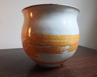 Small white and orange bowl