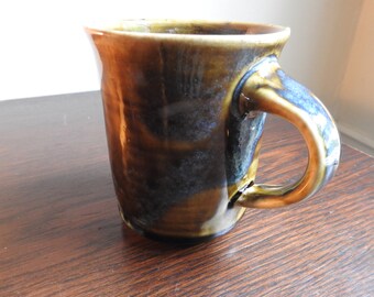 Runny blue coffee mug.