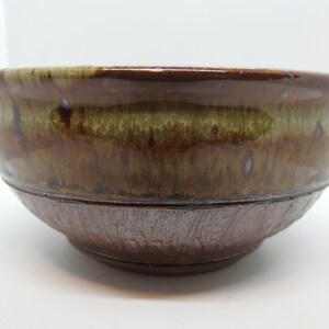 Gold and brown glazed fruit bowl.
