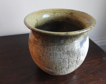 Raku bowl with gold glaze