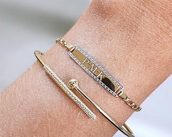 Bracciale identificativo personalizzato in oro bicolore 14 carati con incisione.