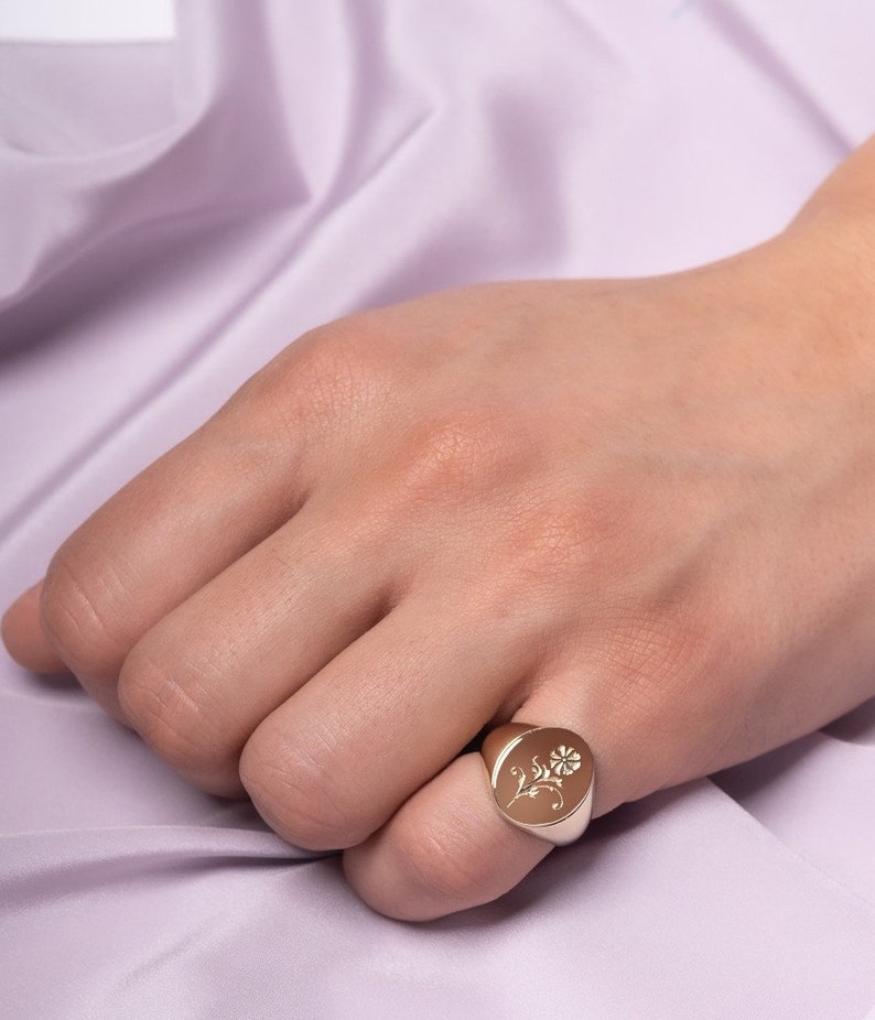 Flower Signet Ring in 14K Gold worn by a model