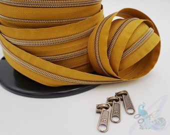1 m endless zipper incl. 3 zippers - wide metallized mustard - old brass