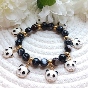 PANDAS! Onyx Bettelarmband 10 mm Klasse AAA echter schwarzer Onyx mit weißen Streifen schöne Variation und klare Farbe unisex für Erwachsene Größe Schmuck