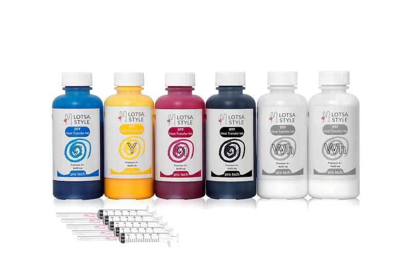 May include: Six bottles of DTF heat transfer ink in cyan, yellow, magenta, black, and two bottles of white ink. The bottles are labeled "Lotsa Style" and "pro tech". The ink is used for printing on fabric.