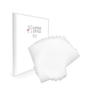 May include: A stack of white DTF PET film sheets for use with a direct to film printer. The sheets are packaged in a white box with the text "Lotsa Style DTF PET Film" printed on the front.