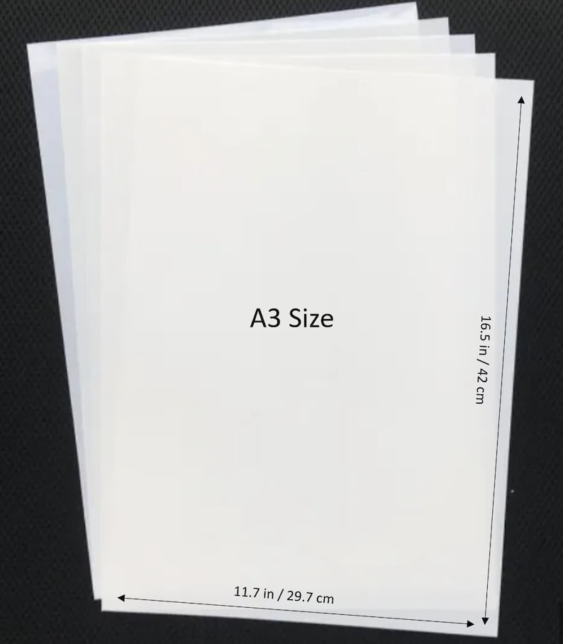 May include: A stack of white A3 size paper sheets, measuring 11.7 inches by 16.5 inches.