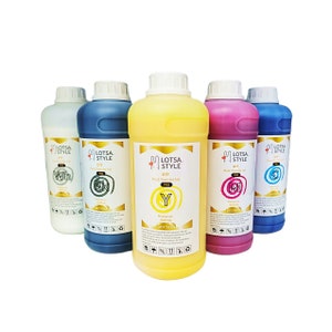 May include: Five bottles of DTF heat transfer ink in white, black, yellow, magenta, and cyan. The bottles are labeled with the brand name "Lotsa Style" and the color of the ink. The ink is for use with a DTF printer.