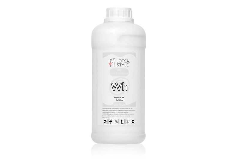 May include: A white plastic bottle with a white label that says "Lotsa Style" and "Wh Premium-All-Round Ink". The label also has a pink heart with a rabbit inside.