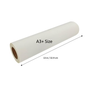 May include: A white roll of paper labeled "A3+ Size" with a measurement of 13 in / 32.9 cm.