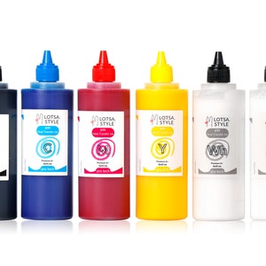 May include: Six bottles of heat transfer ink in black, cyan, magenta, yellow, and two white bottles. The bottles are labeled with the brand name "Lotsa Style" and the color of the ink. The bottles are all the same size and shape.