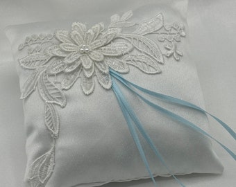 Ivory Duchess Satin and lace ring bearer pillow, with 3D appliqué flower with pearl detail and blue ribbon ties.