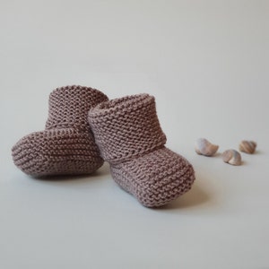 Hand knitted baby slippers - socks from soft, pure merino wool. Very stretchy and comfy. Perfect accessory for newborn baby or for toddler. Absolutely gender neutral, in nice dark beige color.