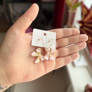 Handmade polymer clay earrings cute gold and white glitter bows