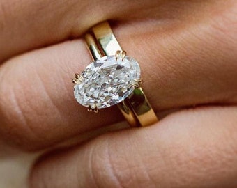 Conjunto nupcial de moissanita de corte ovalado de 3,50 ct con anillo de compromiso y alianza de eternidad sencilla