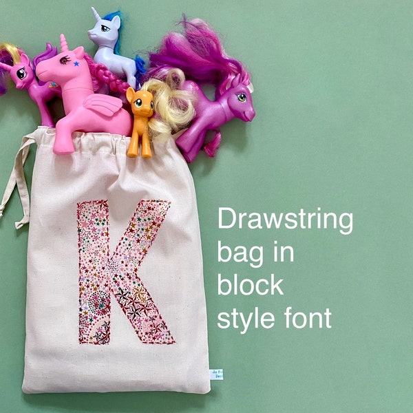 Drawstring bag, personalised with 1 Liberty fabric initial in a block style font. Use for toys, storage, nursery decor, travel or as a gift.