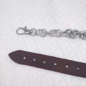 Quality Leather Construction Handmade Sporran Strap Durable Metal Chain Highland Costume Accessory Traditional Scottish Design Adjustable Buckle System Secure Waist Attachment Custom Fit Option Authentic Kilt Component Festival Performance