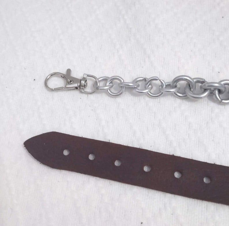 Quality Leather Construction Handmade Sporran Strap Durable Metal Chain Highland Costume Accessory Traditional Scottish Design Adjustable Buckle System Secure Waist Attachment Custom Fit Option Authentic Kilt Component Festival Performance