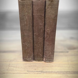 May include: A rustic wooden sign with the text "Welcome to our porch" in white lettering. The sign features a distressed finish and a simple, inviting design, perfect for outdoor decor.