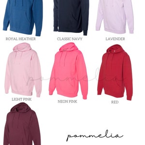 a group of different colored hoodies with the names of them