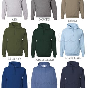 a group of men's hooded sweatshirts in different colors