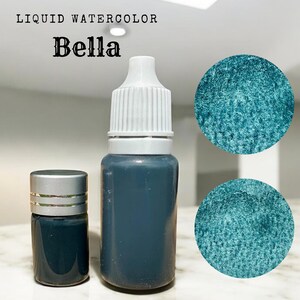 May include: Two bottles of liquid watercolor paint in the color Bella. The smaller bottle is 10 ml and the larger bottle is 30 ml. The paint is a dark teal color.