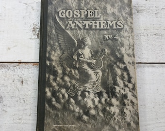 May include: Vintage "Gospel Anthems No. 4" book with a gray cover featuring an angel playing a harp. The cover has embossed lettering and a detailed illustration. The book's spine is dark green, and the copyright reads 1905 by M&R.