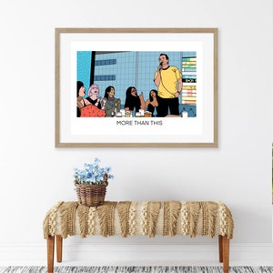 May include: A framed illustration of a group of people sitting around a table, with one person standing and speaking into a microphone. The text "MORE THAN THIS" is printed below the image.