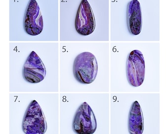 May include: Nine polished gemstones in various shapes, each displaying a unique pattern of purple, white, and brown hues. The gemstones are arranged in a grid, showcasing their individual designs and textures. The stones are ideal for jewelry making.