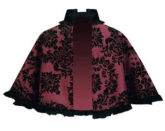 May include: A short cape featuring a deep red base with a black velvet damask pattern. The garment includes a high collar with black trim, a central vertical panel, and a ruffled black lace border along the bottom hem and collar edge.