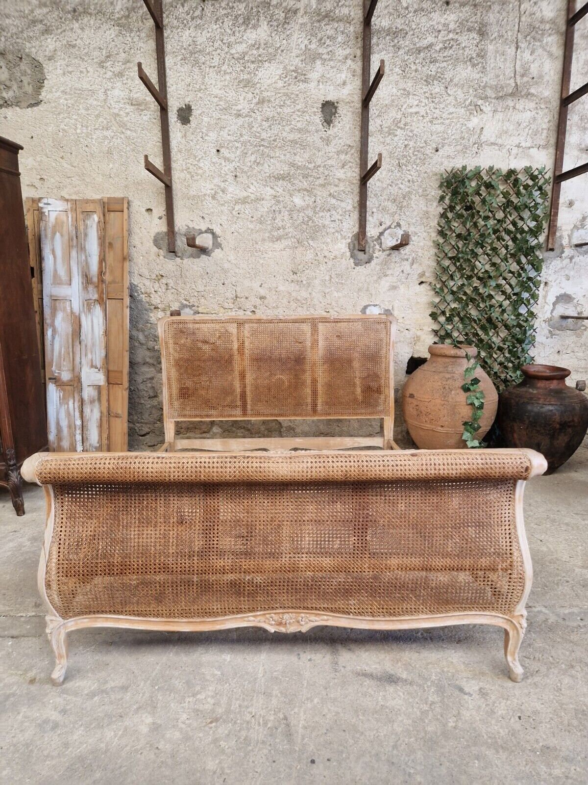 Cane sleigh bed outlet