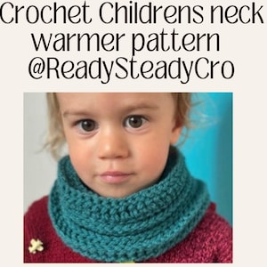 May include: A close-up of a child wearing a teal blue crocheted neck warmer. The child is wearing a red sweater. The image includes the text "Crochet Childrens neck warmer pattern @ReadySteadyCro".
