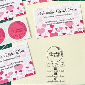 May include: A pink and white business card with a heart pattern and the text "Annelise With Love Handmade Contemporary Cards" and "Etsy & Facebook - Annelise With Love Instagram - @annelisewithlove".