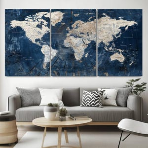 Large 3-panel Blue World Map Canvas Print with detailed continents, framed wall art perfect for living rooms, offices, and travel enthusiasts. Ready to hang for easy setup.
