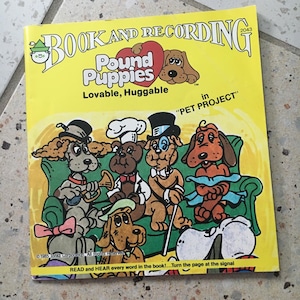 Vinyl en boek van puppy&#39;s uit 1981