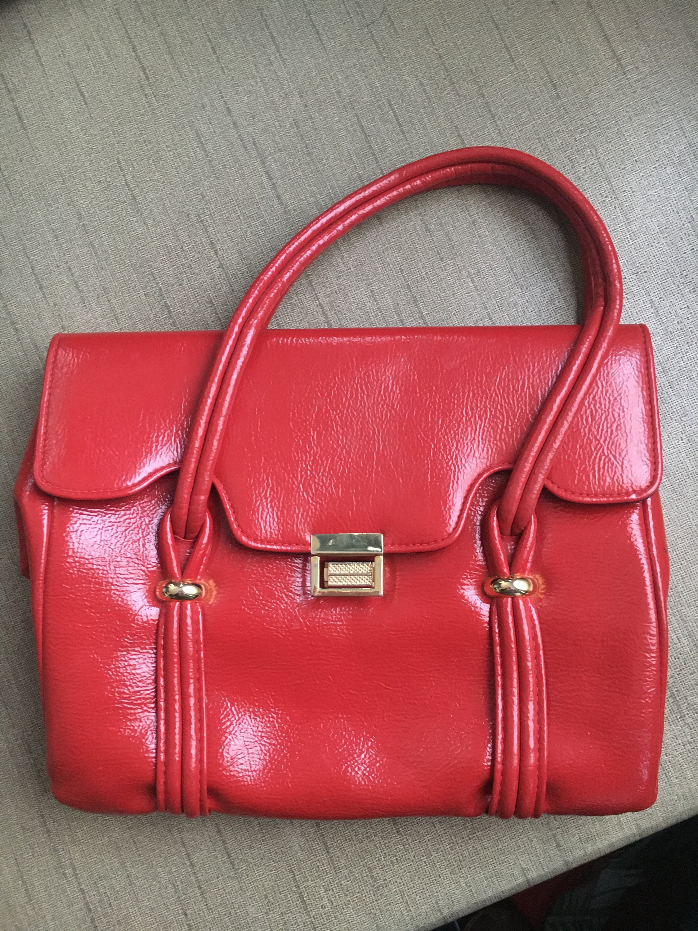 Red handbags shop sale