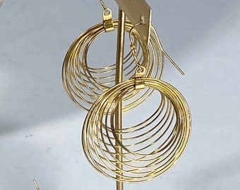 Gold Coil earrings, 18k goldf/steel, 18kgf ear wire. Super light weight! by Joe Kimpton, Tucson