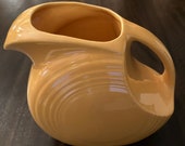 1938-1969 Fiesta Yellow Vintage Water Disk Pitcher