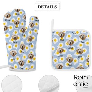 May include: A light blue oven mitt and pot holder set. The set features a repeating pattern of fried eggs and a golden retriever's face with the name "Zeus". The set is quilted.